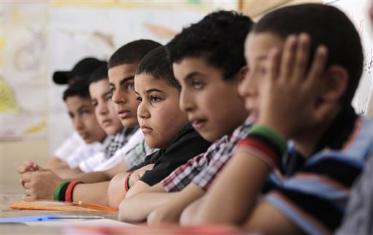 Libyan students are seen inside their class at the Ras Mouftah school in Misrata, Libya, on June 14. Libyan teachers opened the school last week in an attempt to return to normal life. 